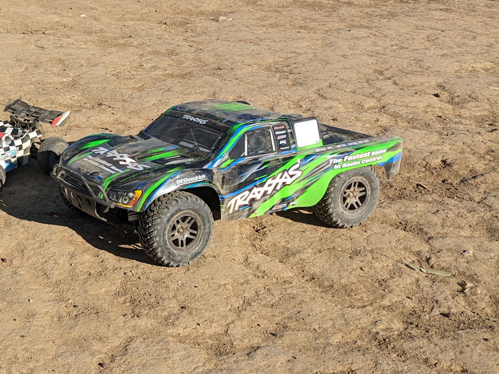 a green traxxas bl-2s slash 4x4