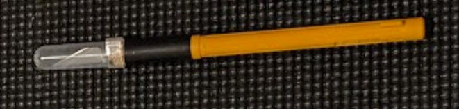 a chunky yellow plastic Alfa hobby knife